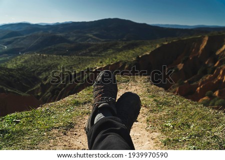 hiking feet photography, panoramic mountain top landscape background