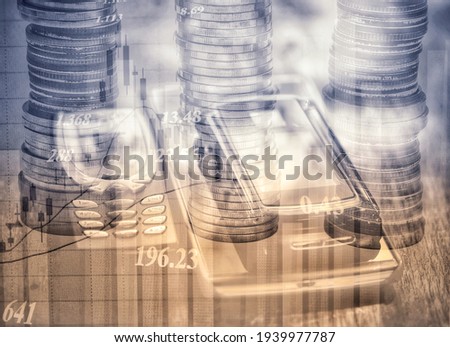 Stock market and Multiple cell phones and Coin stacks
and financial graph.business strategy as concept. Abstract business background.