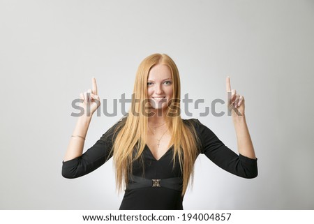 Portrait of business woman on a gray background