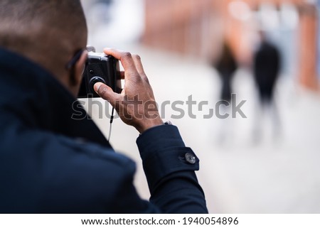 Private Detective Spying On Cheating Woman Wife Royalty-Free Stock Photo #1940054896