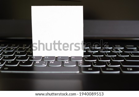 Mock up paper on keyboard. you can add text or message for presentation. business office or work from home. technology computer internet for working concept.
