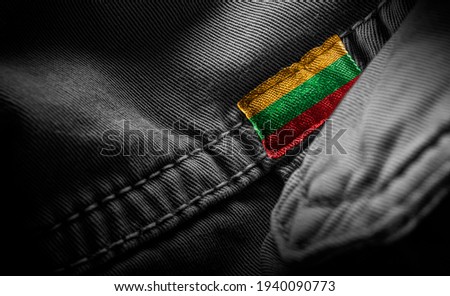 Tag on dark clothing in the form of the flag of the Lithuania.