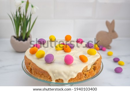 Traditional carrot cake with cream cheese frosting for Easter