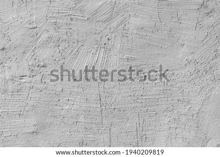 Texture of white plaster on the wall of an old house. Architectural design. 