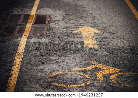 yellow bicycle path on the way