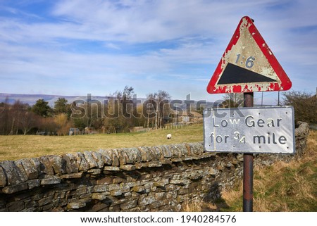 Roadside warning for steep hill