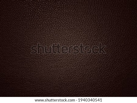 Dark brown artificial leather texture background