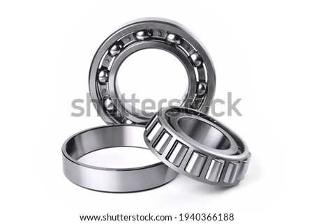 roller bearings on white background, blank for creativity close-up selective focus Royalty-Free Stock Photo #1940366188