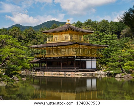Golden pavilion Kinkaku-ji Rokuon-ji  Zen Buddhist temple in Kyoto, Japan. Mirror reflection on water