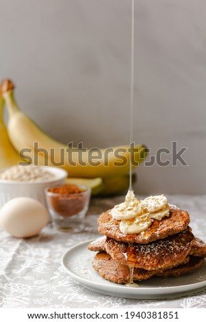 Banana pancakes, ingredients. Healthy food. Place for text Royalty-Free Stock Photo #1940381851