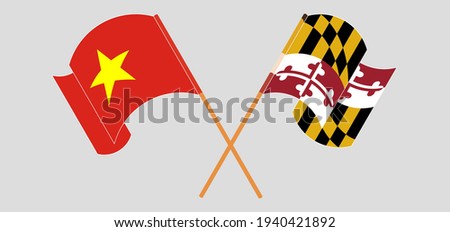 Crossed and waving flags of Vietnam and the State of Maryland