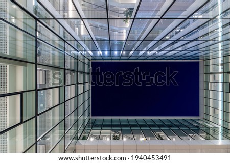 Modern office building with night sky.
