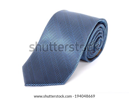 spotted blue tie close up on white background 