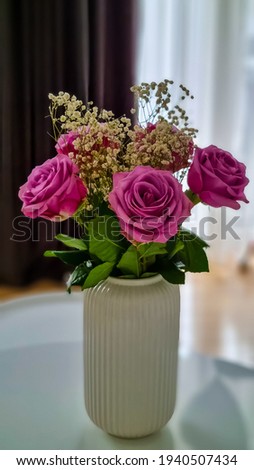 Pink roses bouquet. Indoor flower decoration. Wedding and engagement concept.