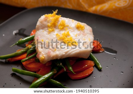 grilled halibut with lemon zest and fresh vegetables