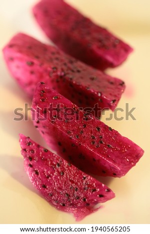 Top view of cut pieces of a dragon fruit.