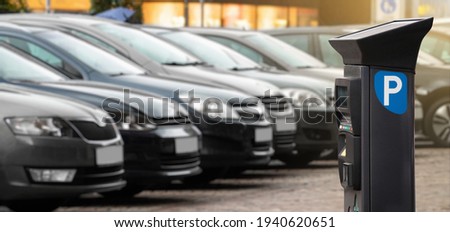 Parking machine with solar panel in the city street. Pay On Foot Parking System Royalty-Free Stock Photo #1940620651