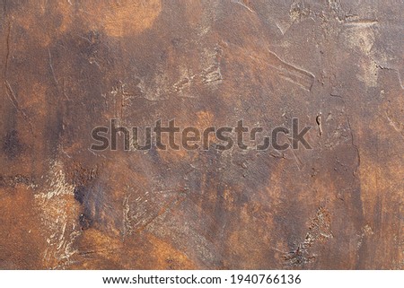 abstract brown chocolate metallic  background texture concrete or plaster hand made wall