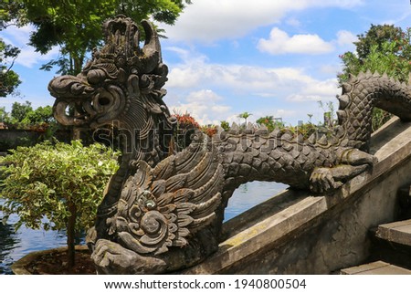 Dragon statue in Water Palace of Tirta Gangga East Bali, Indones.