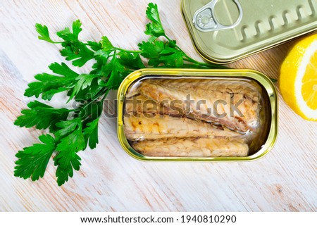 Picture of tasty fillet of mackerel in sunflower oil in open tin can