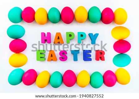 a frame of colorful Easter eggs and a Happy Easter text in the center. concept of the celebration of Easter Sunday in the Christian tradition.