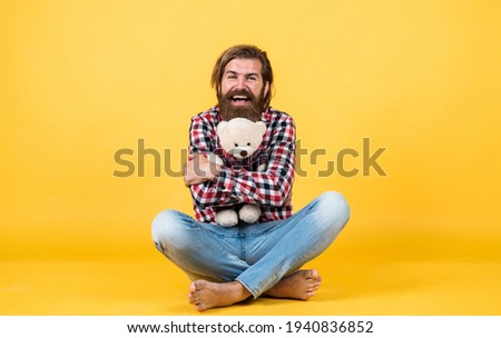 for me. This is for you. hipster like animal toy. Birthday holiday party celebration. feel happiness. Man with beard hold cute toy bear. Man holds teddy bear. Gifts and holidays concept