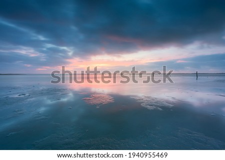 Colorful and beautiful sunset and Dutch landscape 