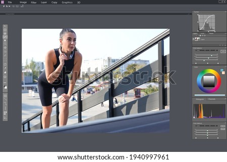 Professional photo editor application. Image of young woman in sportswear with headphones