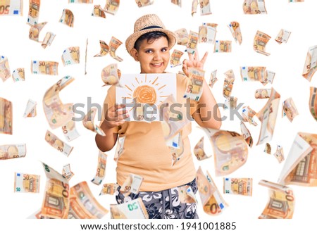 Little boy kid holding sun draw doing ok sign with fingers, smiling friendly gesturing excellent symbol