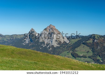 A scenic view of Kleiner and Grosser Mythen from the Fronalpstock mountain, Swirzerland Royalty-Free Stock Photo #1941011212