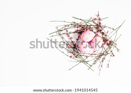 Easter eggs on white background. Minimal concept of Easter. Flat lay, top view, copy space. Banner.