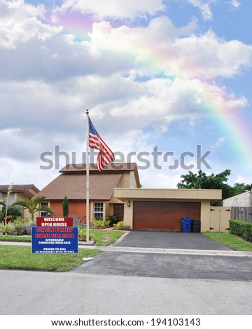 Real Estate for sale open house welcome sign American flag pole Rainbow Suburban home Residential Neighborhood USA Blue sky clouds