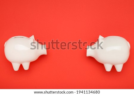 Piggybanks on the red background