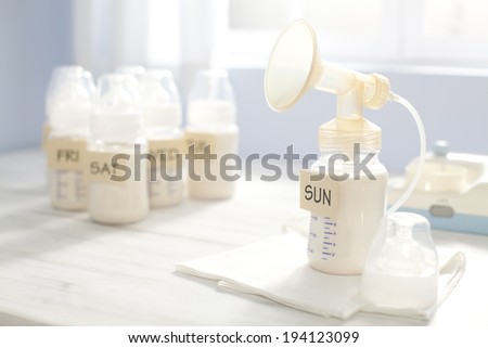 the image of parenting and breast pump Royalty-Free Stock Photo #194123099