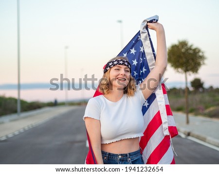 young woman celebrating independence day of the united states