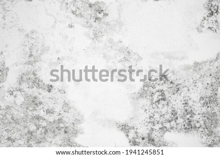 Grungy white concrete wall, abstract seamless background photo texture