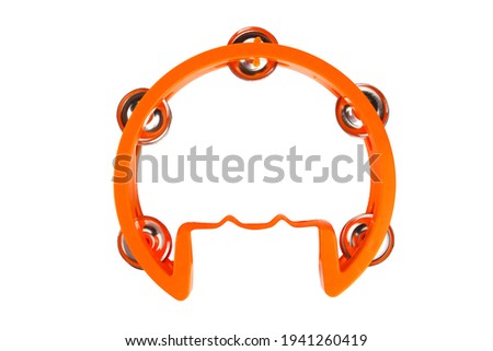 Orange tambourine. On a white background, isolated.