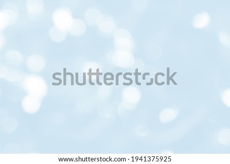Abstract blur light blue background with soft shimmer for display, light blue bokeh, abstract background,out focus