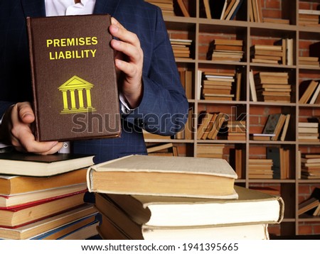  PREMISES LIABILITY book's title. Premises liability is the liability that a landowner or occupier has for certain torts that occur on their land Royalty-Free Stock Photo #1941395665