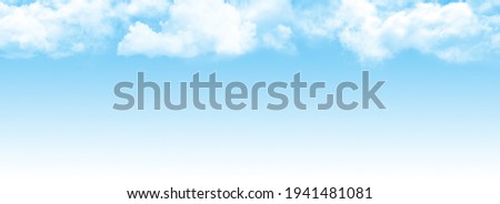 Blue sky with light clouds. Wide summer sky backdrop