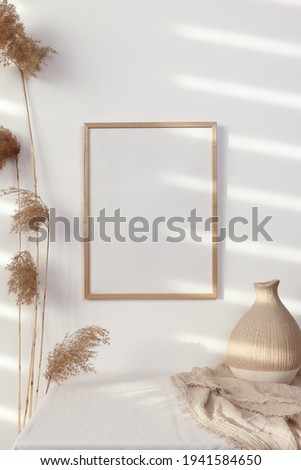 Wooden photo frame mockup with dry cane