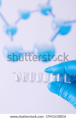 Forensic Scientist in Lab. The Forensic science. Check the DNA from the hair in the lab