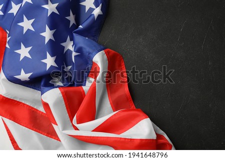 American flag on black table, top view with space for text. Memorial Day