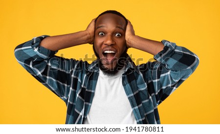 Shocked African American Man Shouting Omg Touching Head, Yellow Background