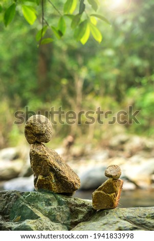 Stacked rocks on nature background