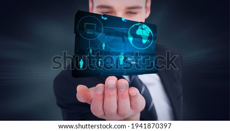 Composition of network of digital icons with globe on digital screen over hand of businessman. global technology and digital interface concept digitally generated image.