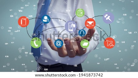 Composition of network of digital icons with numbers processing over hand of businessman. global technology and digital interface concept digitally generated image.