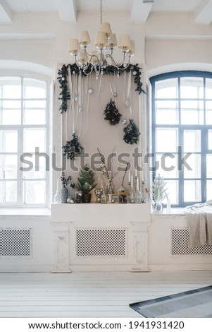 Decoration of the fireplace in the New Year theme.