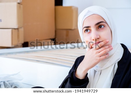 Arabic muslim woman wondering what to do with all the work