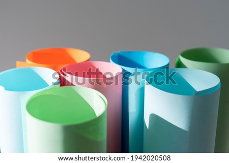 some rolls of abstract pastel colors, close up creative sheets design